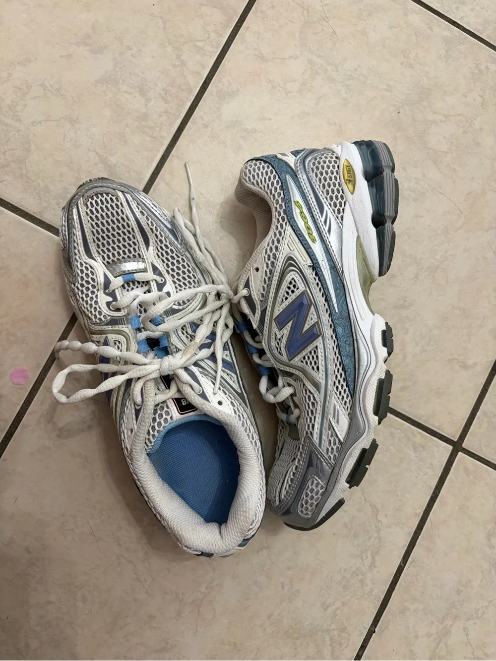 New Balance White and Light Blue Athletic Sneakers